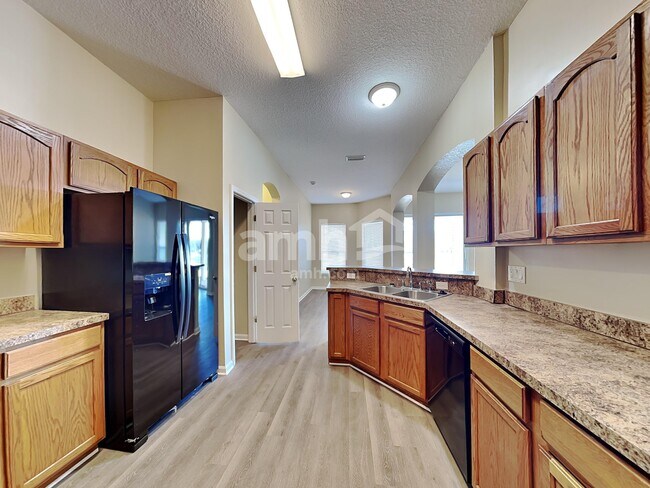 Foto del edificio - 7117 Rapid River Dr W