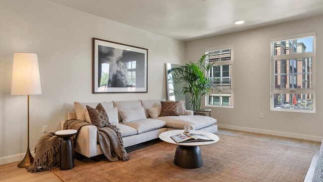 Living room with open layout in Jade model - The Residences At Sugar Alley