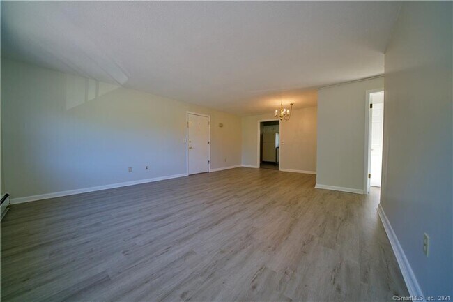 Living area with brand new flooring - 317 High Path Rd