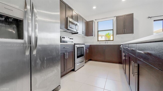 Building Photo - 3 br, 2.5 bath House - 25490 SW 108th Ct