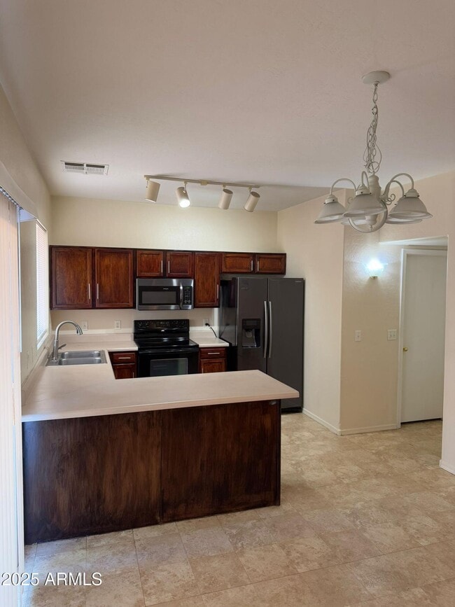 Building Photo - 7207 N 69th Dr