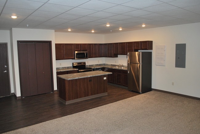 Building Photo - Essential Living - market rate apartments