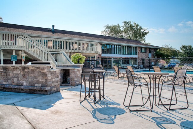 BBQ and eating area - The Meadows Apartments