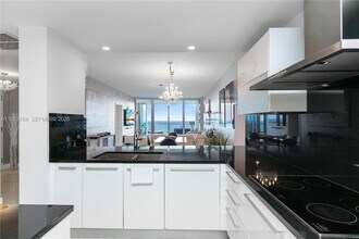 Building Photo - 17121 Collins Ave