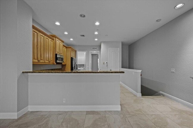 Foto del edificio - 4902 Vine Cliff Way E