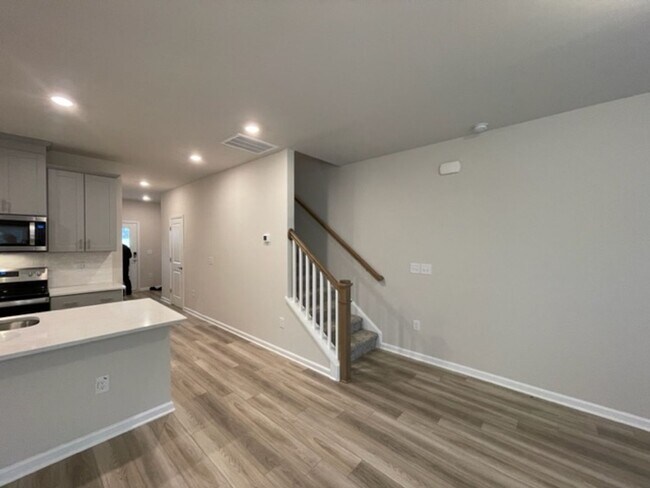 Building Photo - Like New Townhome in South & Main, Fuquay-...