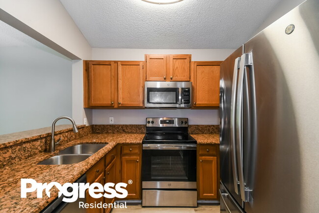 Building Photo - 12655 Ashmore Green Dr N