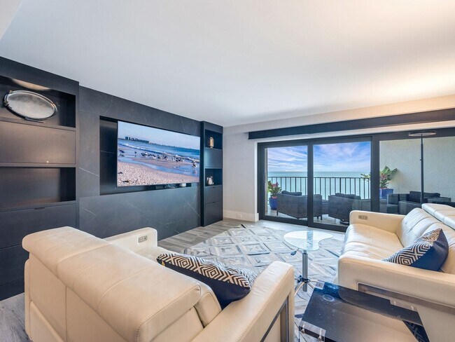 Building Photo - PRICE REDUCTION! $8,000/mo. -  Beach-front...