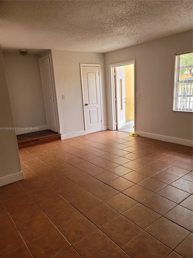 Building Photo - 5970 NW 25th Ct