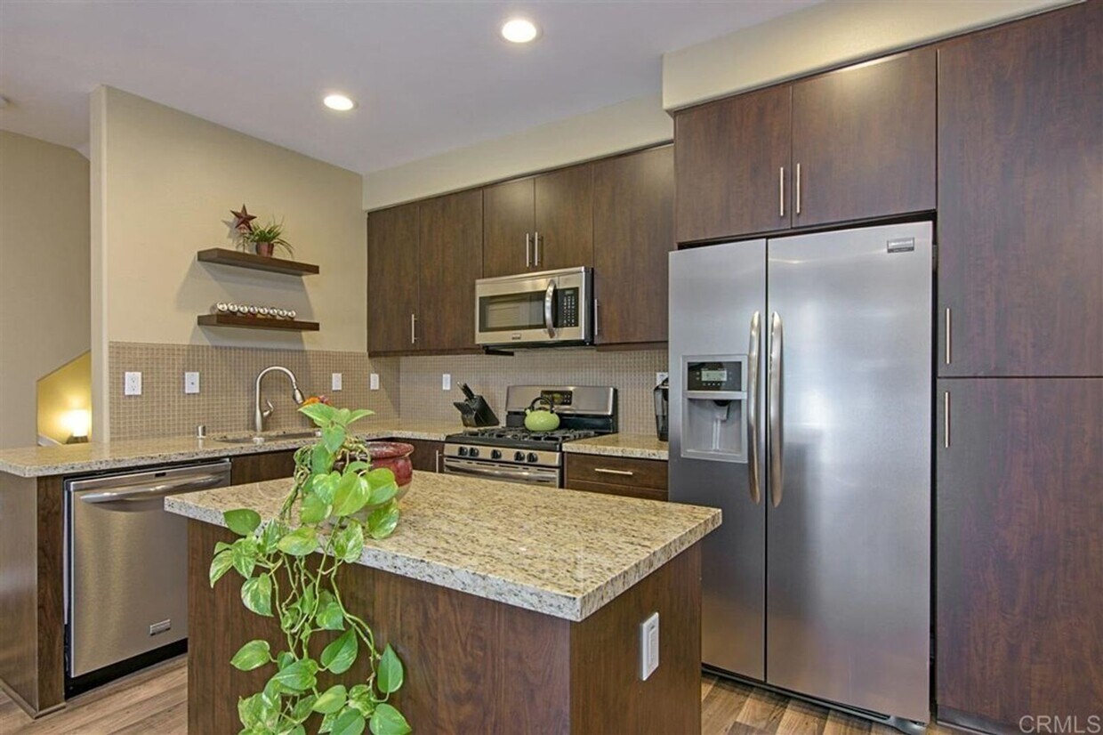 Primary Photo - Spacious 2 Bedroom + Office/Den Townhome i...