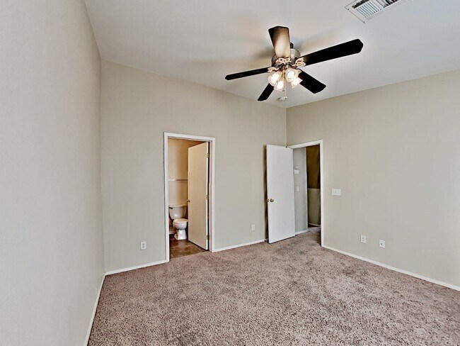 Building Photo - 5920 Trickling Descent St Unit 102
