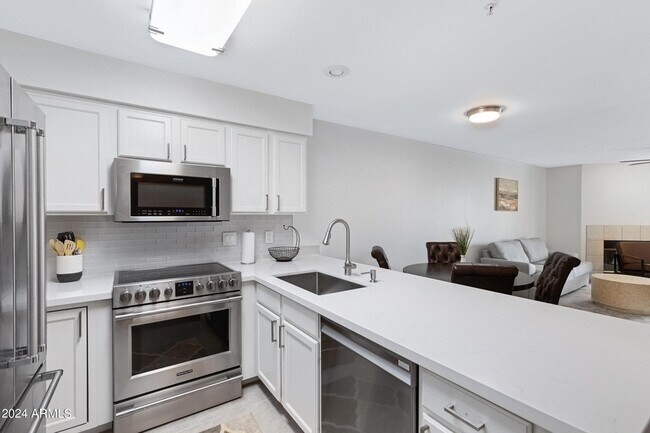 Building Photo - 10080 E Mountainview Lake Drive Unit 215