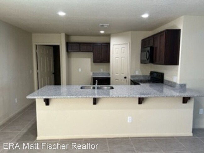 Foto del edificio - 4 br, 2.5 bath House - 7404 E. 38th Ln.