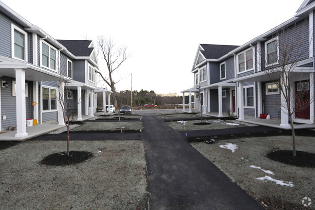 Foto del edificio - Dunstan Village Townhomes