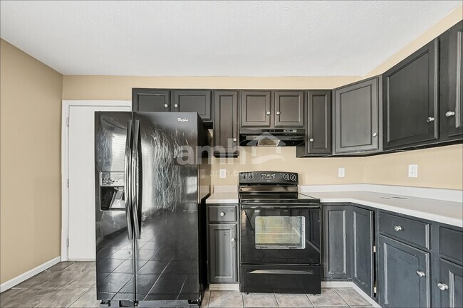 Foto del edificio - 6401 Sharps Ridge Ct