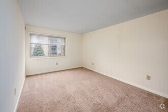2BR+Den, 1BA - 1,030SF - Bedroom - Rock Creek Woods