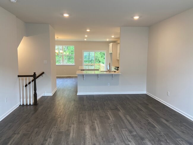 2nd Floor View of Living room into Kitche and dining space - 403 E International Rd