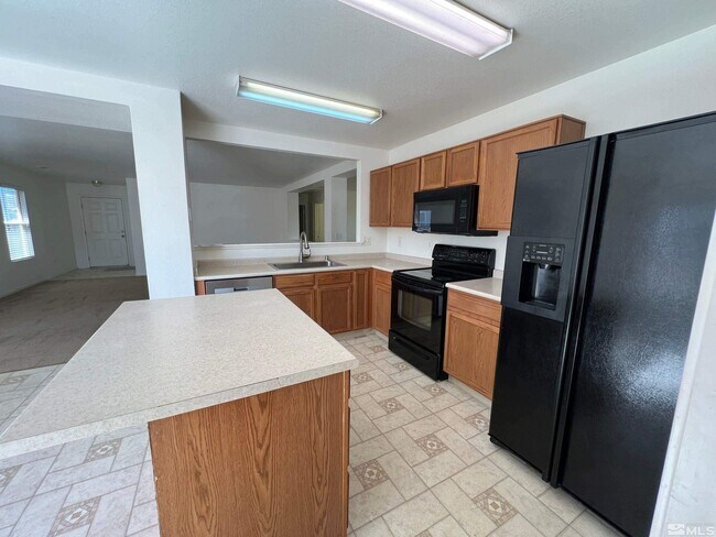 Foto del edificio - 9648 Autumn Leaf Way