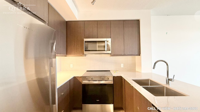 Building Photo - 3270 Sheppard Av E