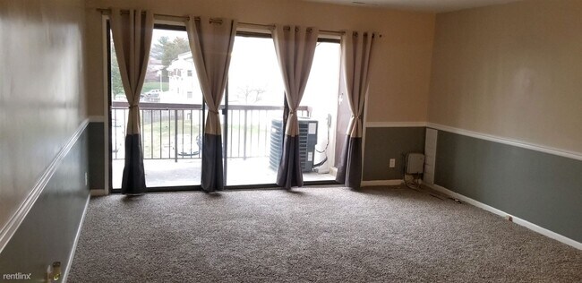 Foto del edificio - 2 br, 2 bath Condo - 10137 Prince Pl Apt 401B