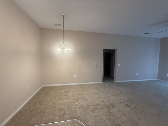 Building Photo - FOR RENT:  3 BEDROOM 2 BATHROOM CONDO LOCATED IN TIMBER RUN