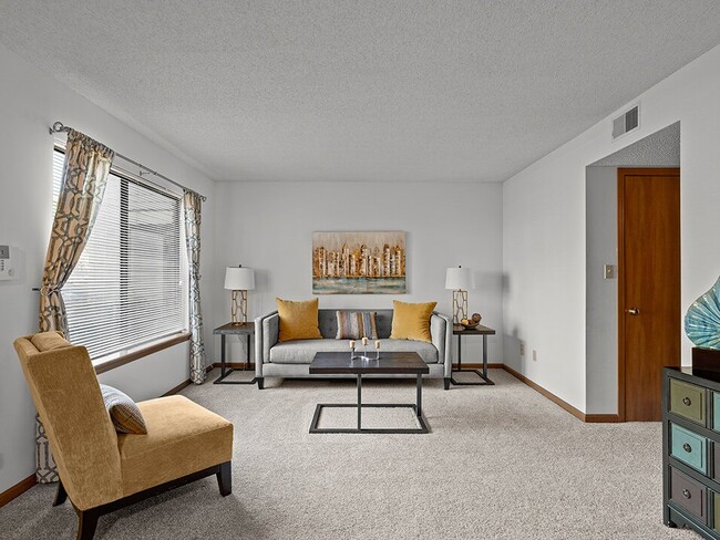 Open Living Room with Natural Light - Villa West Apartments and Townhomes