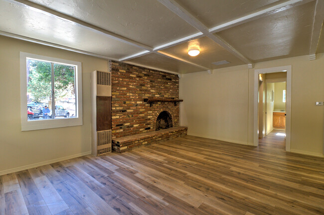 Living room with full fireplace - 23941 Springwater Rd