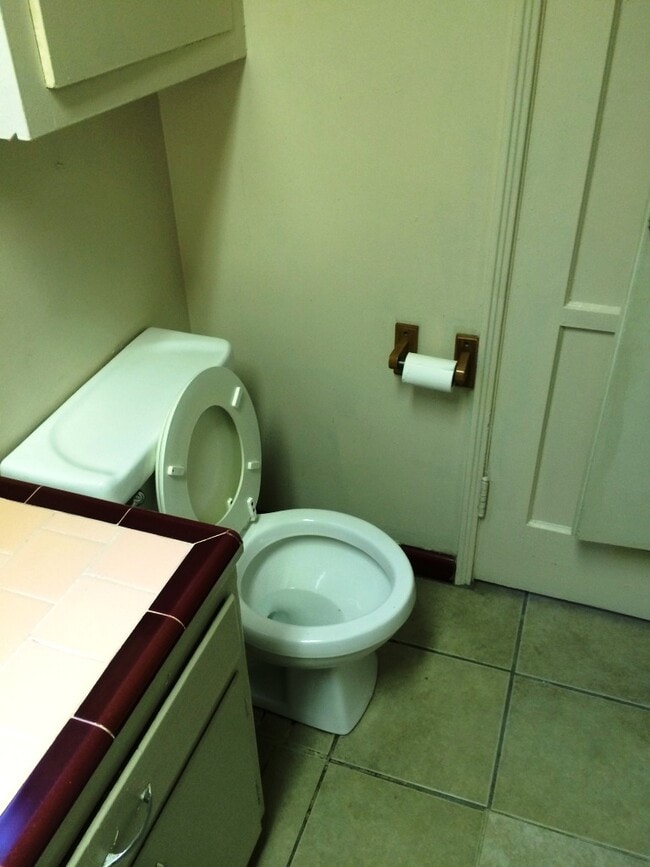 Private bathroom showing commode - 5646 Farmdale Ave