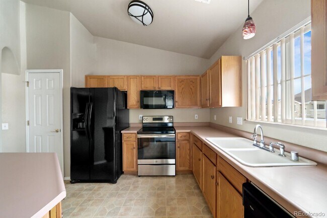 Building Photo - 3875 Strawberry Field GR #E, Colorado Spri...