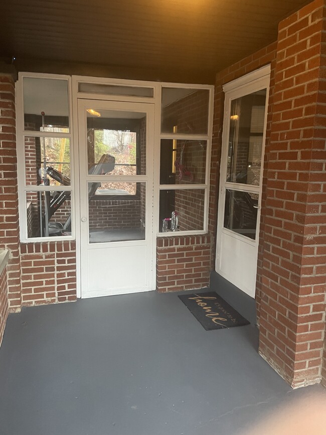 Main entrance and sunroom - 1815 Holly Rd