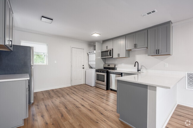 2BR, 1BA - 1,100SF - Kitchen - Woodland Apartments