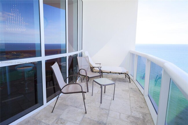 Building Photo - 18201 Collins Ave