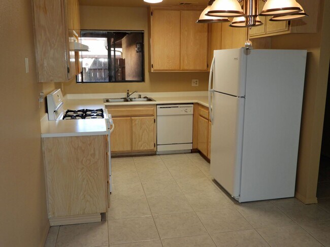 New Stove, stove vent, refrigerator and kitchen light. - 58 Village Cir Dr