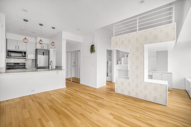 Foto del edificio - 150-156 W 56th St