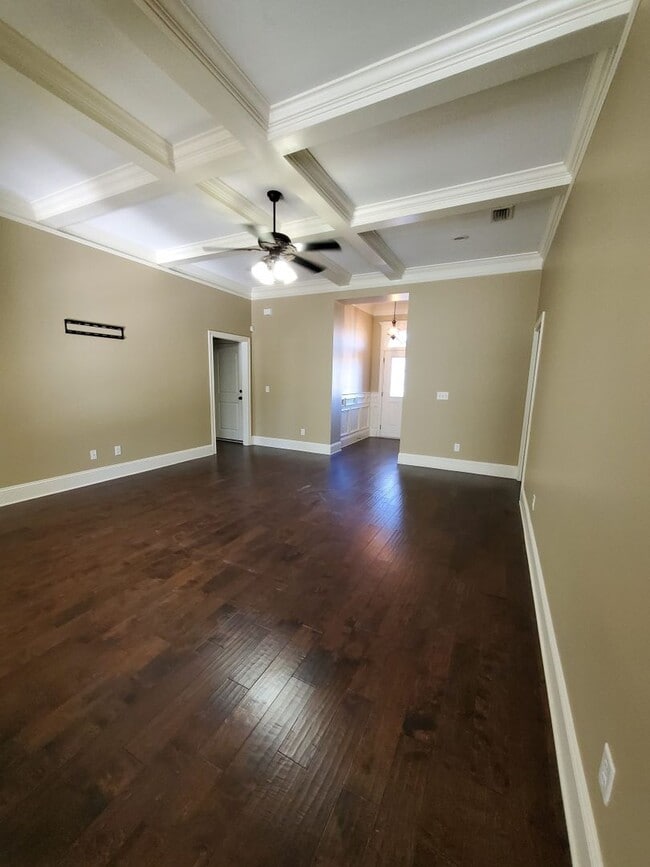 Building Photo - Spacious 4-Bedroom Home with Open Layout, Granite Finishes & Fenced Yard