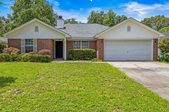 Building Photo - Charming All-Brick Home with Garage & Cove...