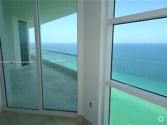 Building Photo - 16047 Collins Ave