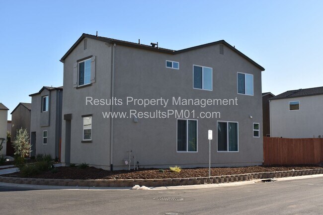 Building Photo - 4 br, 2.5 bath House - 6762 Mangosteen Ln