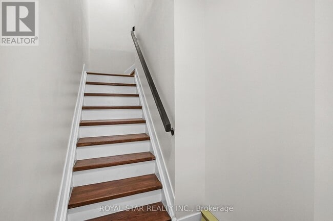 Photo du bâtiment - 518-518 Tanguay Ct