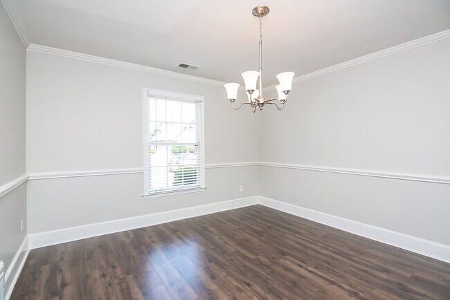 Building Photo - 8159 Creekside Cir N