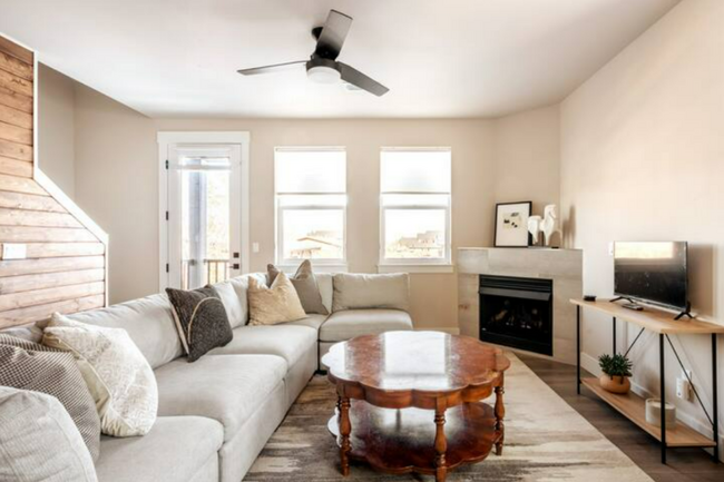 Living room with view of front of house and balcony - 20563 Gloucester Ln