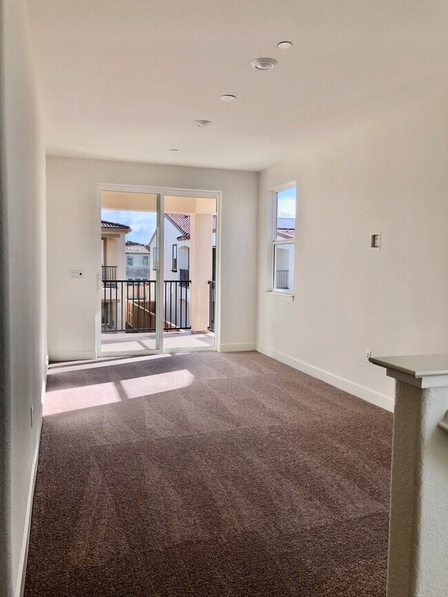 loft opening to large balcony - 5660 Highport Dr