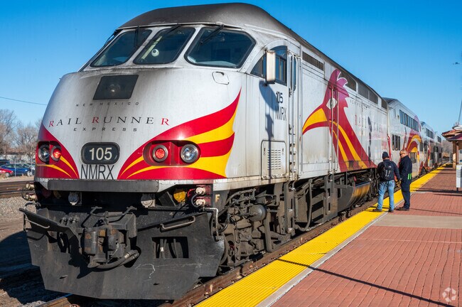 Engineers inspect the Rail Runner before departure to Albuquerque from Belen.