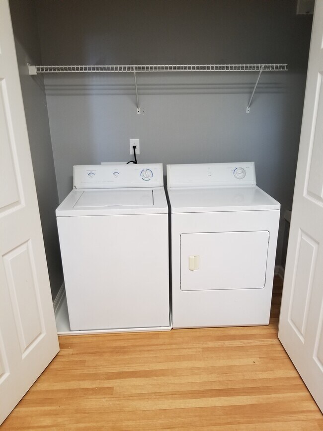 Laundry area off of kitchen on main level - 48 Timber Ridge Dr