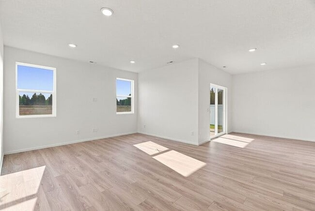 Building Photo - Modern 4-Bedroom Home with a 3-Car Garage & Covered Patio