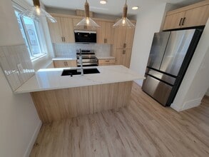 Building Photo - 16335-16384 84 St NW