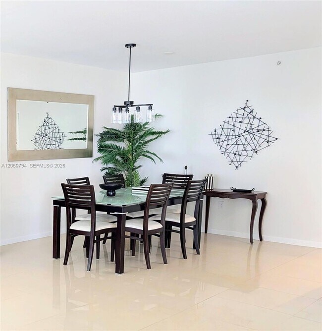 Building Photo - 10275 Collins Ave