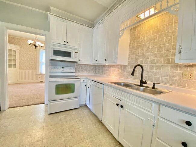 Beautiful Kitchen with Matte Black Fictures - 218 Phelps St