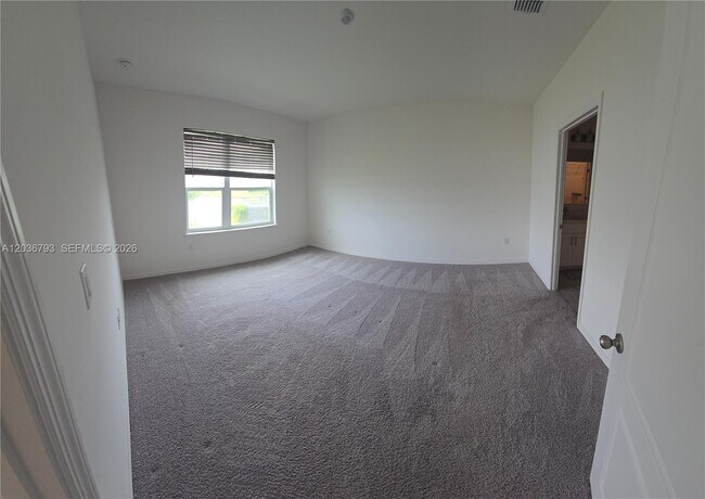 Building Photo - 10500 SW Vasari Way