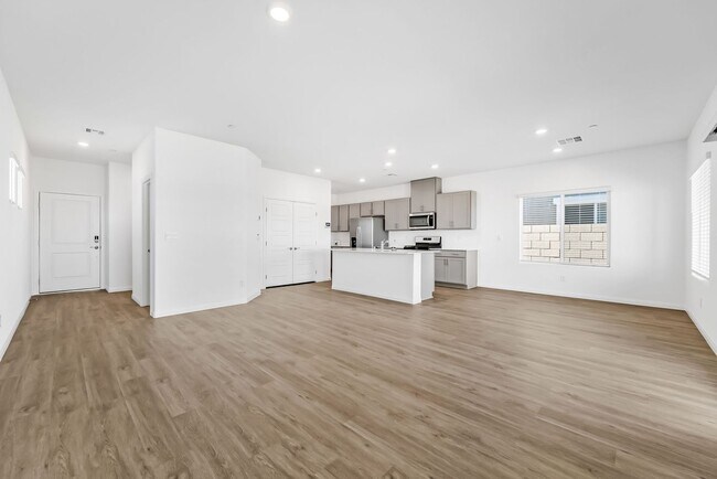 Building Photo - Modern Cadence Living with Designer Finishes & Open-Concept Style!